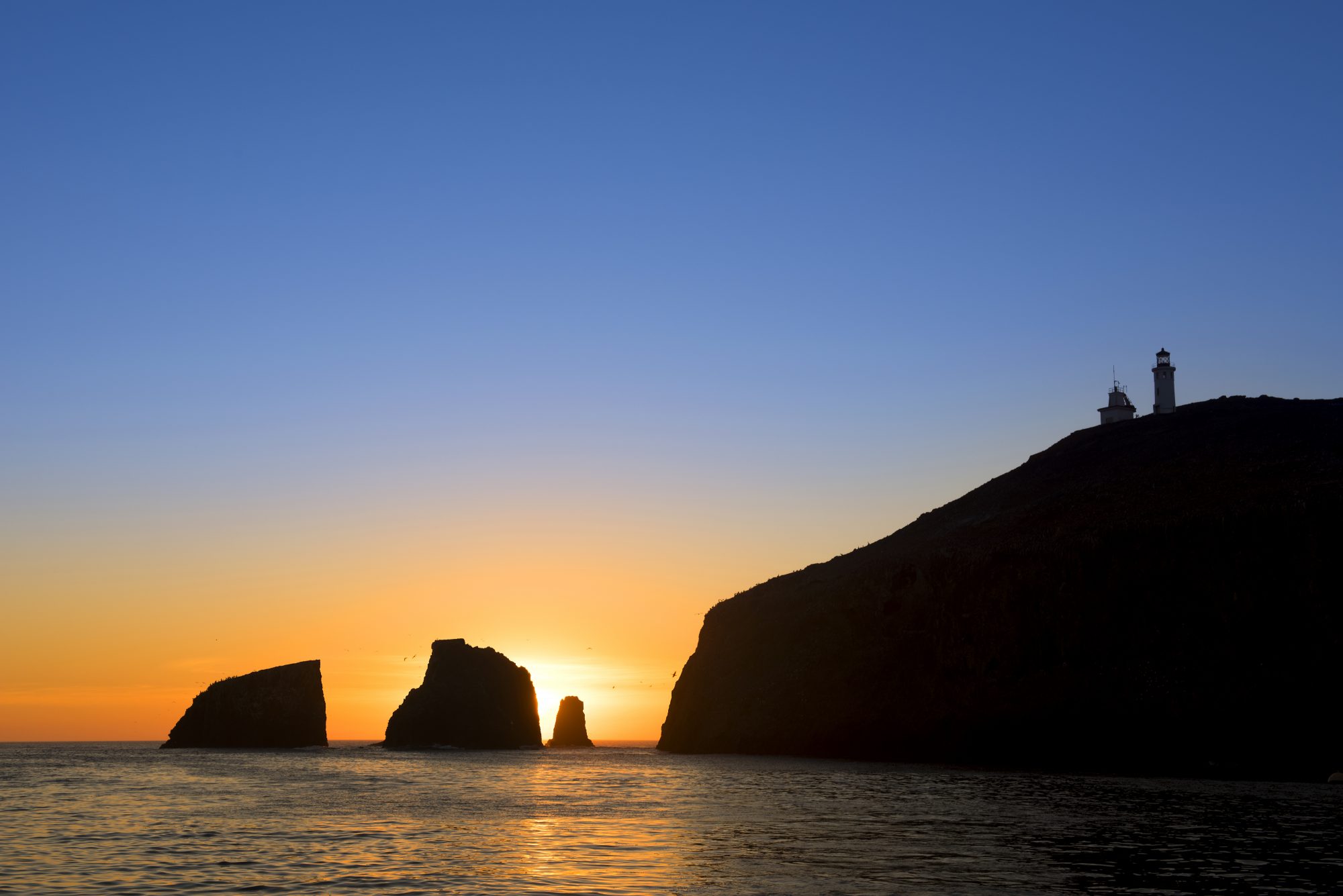 A beautiful sunrise at Anacapa Island in California shows a vibr